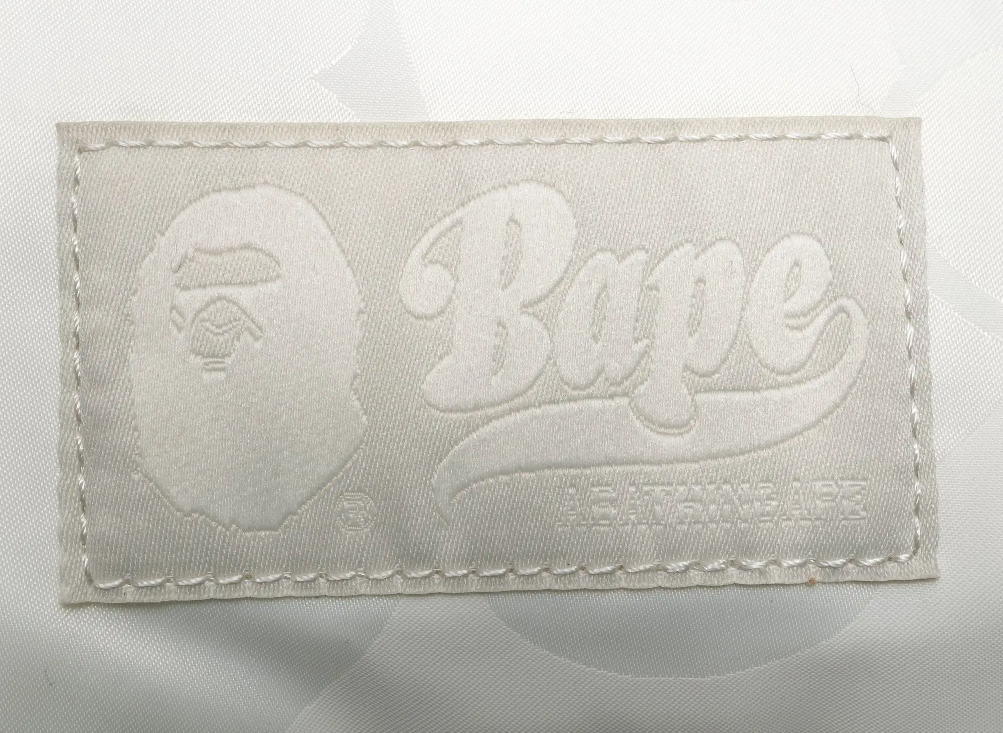 A Bathing Ape Tonal Solid Camo Shoulder Bag in Ivory