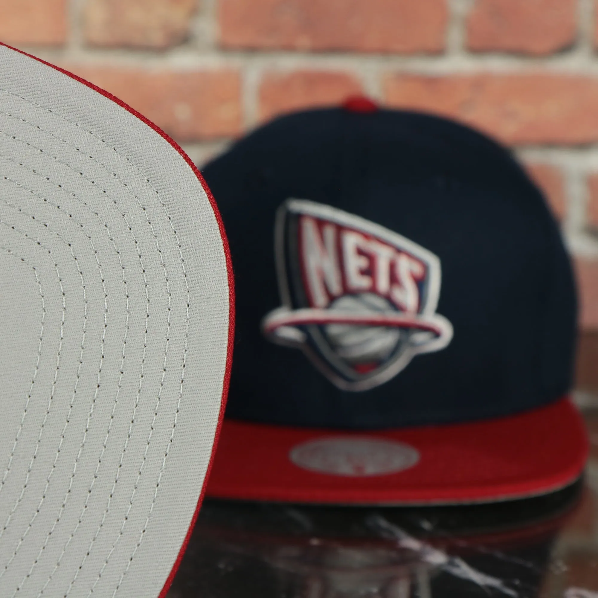 New Jersey Nets Hardwood Classics Jumbotron Nets Ripped Wordmark side patch Grey Bottom Navy/Red Snapback hat | Mitchell and Nes