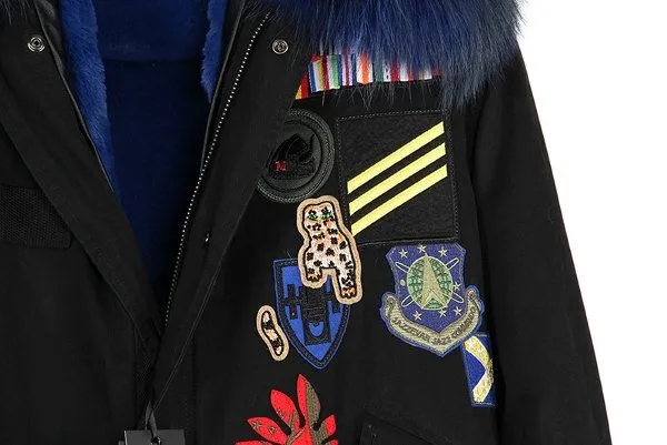 Women winter coat with embroidered badges and fur hood