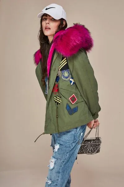 Women winter coat with embroidered badges and fur hood